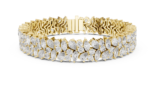 Gold bracelet with diamond accents on a white background