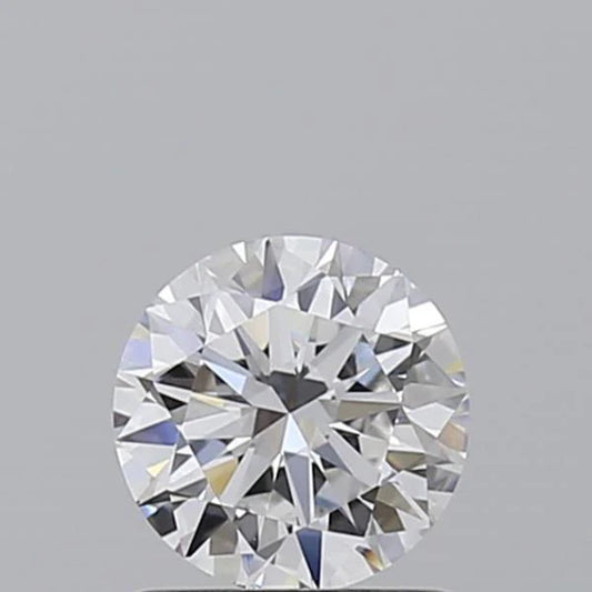 Round cut diamond on a gray background