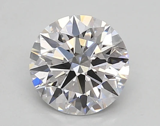 Round cut diamond on a gray background
