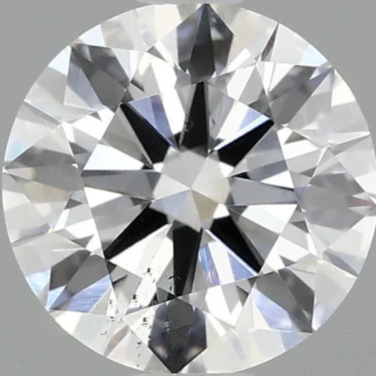 Close-up of a round diamond with a gray background