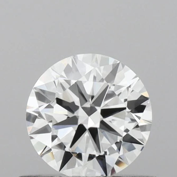Round cut diamond on a gray background