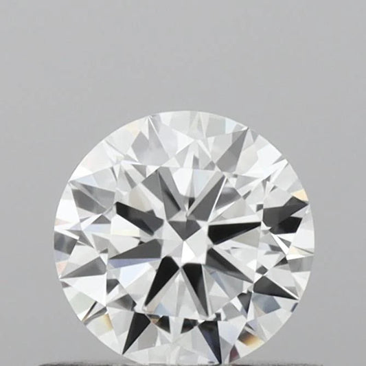 Round cut diamond on a gray background