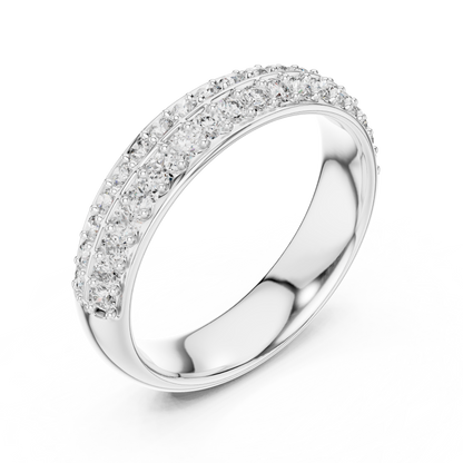 Silver ring with diamond accents on a white background