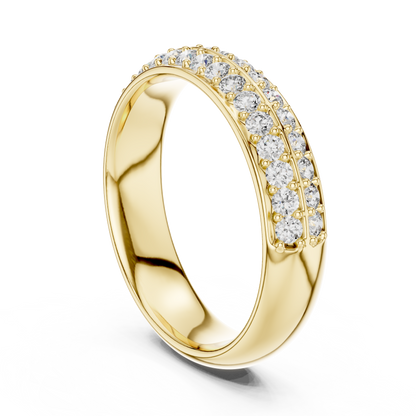 Gold ring with diamond accents on a white background