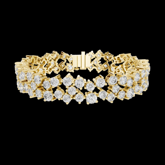 Gold bracelet with diamond accents on a white background