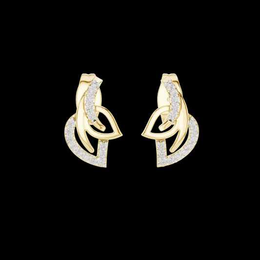 Pair of gold earrings with intricate designs on a black background