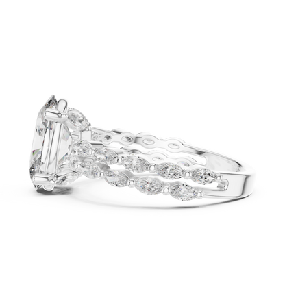 Diamond ring with emerald-cut center stone and intricate band on a white background