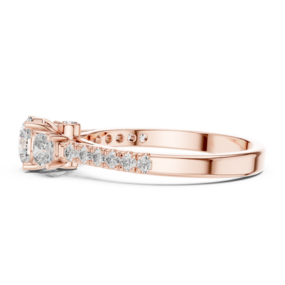 Rose gold ring with diamond accents on a white background