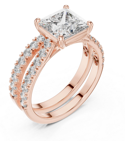 Rose gold ring with a large diamond and smaller diamonds on the band against a white background
