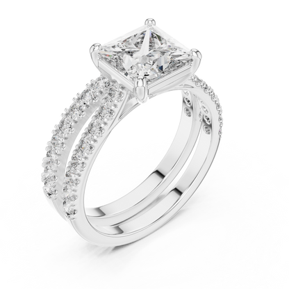 Diamond ring with a princess-cut center stone on a white background