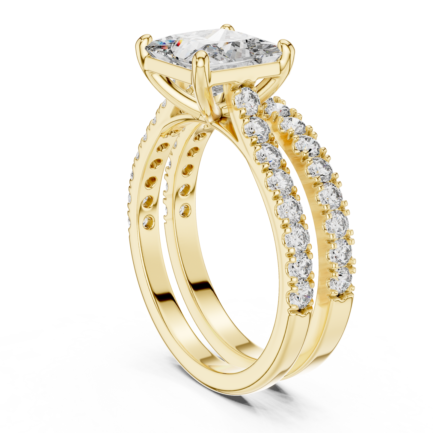 Gold ring with a large diamond and smaller diamonds on the band against a white background