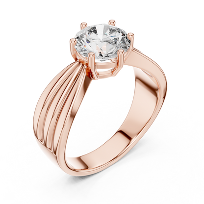 Rose gold ring with a large diamond on a white background
