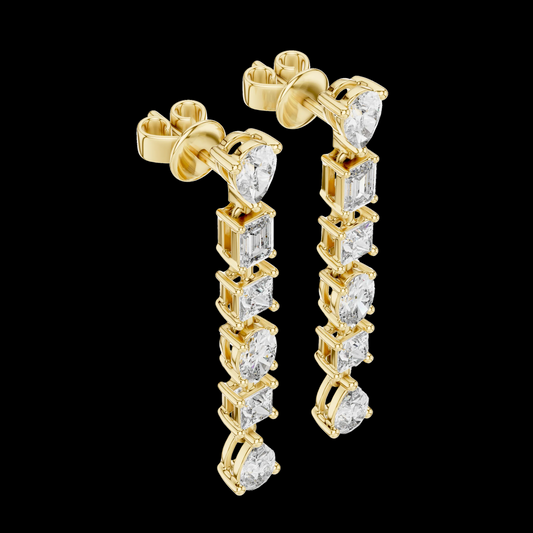 Gold earrings with clear gemstones on a black background