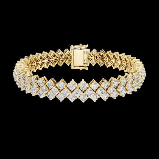 Gold bracelet with diamond accents on a white background