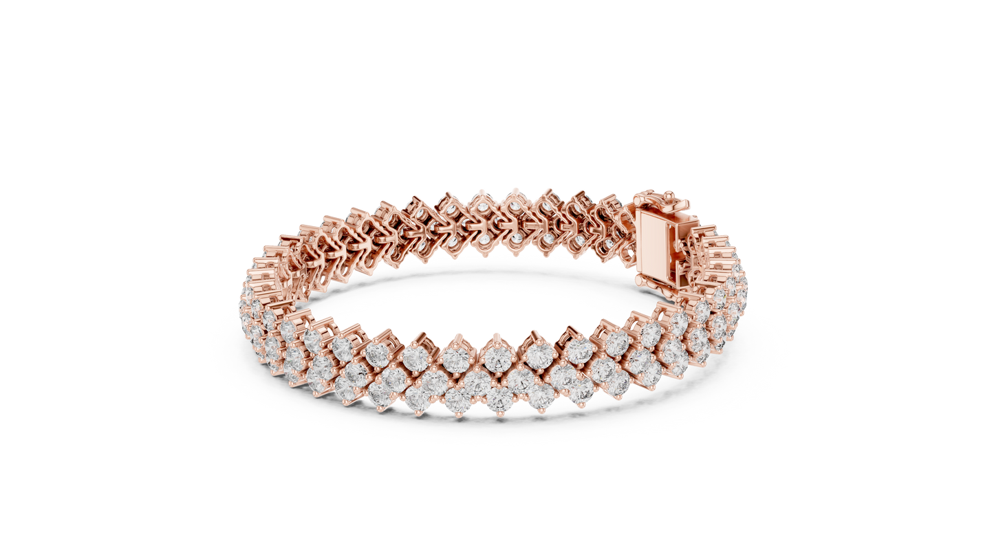 Rose gold bracelet with diamond accents on a white background