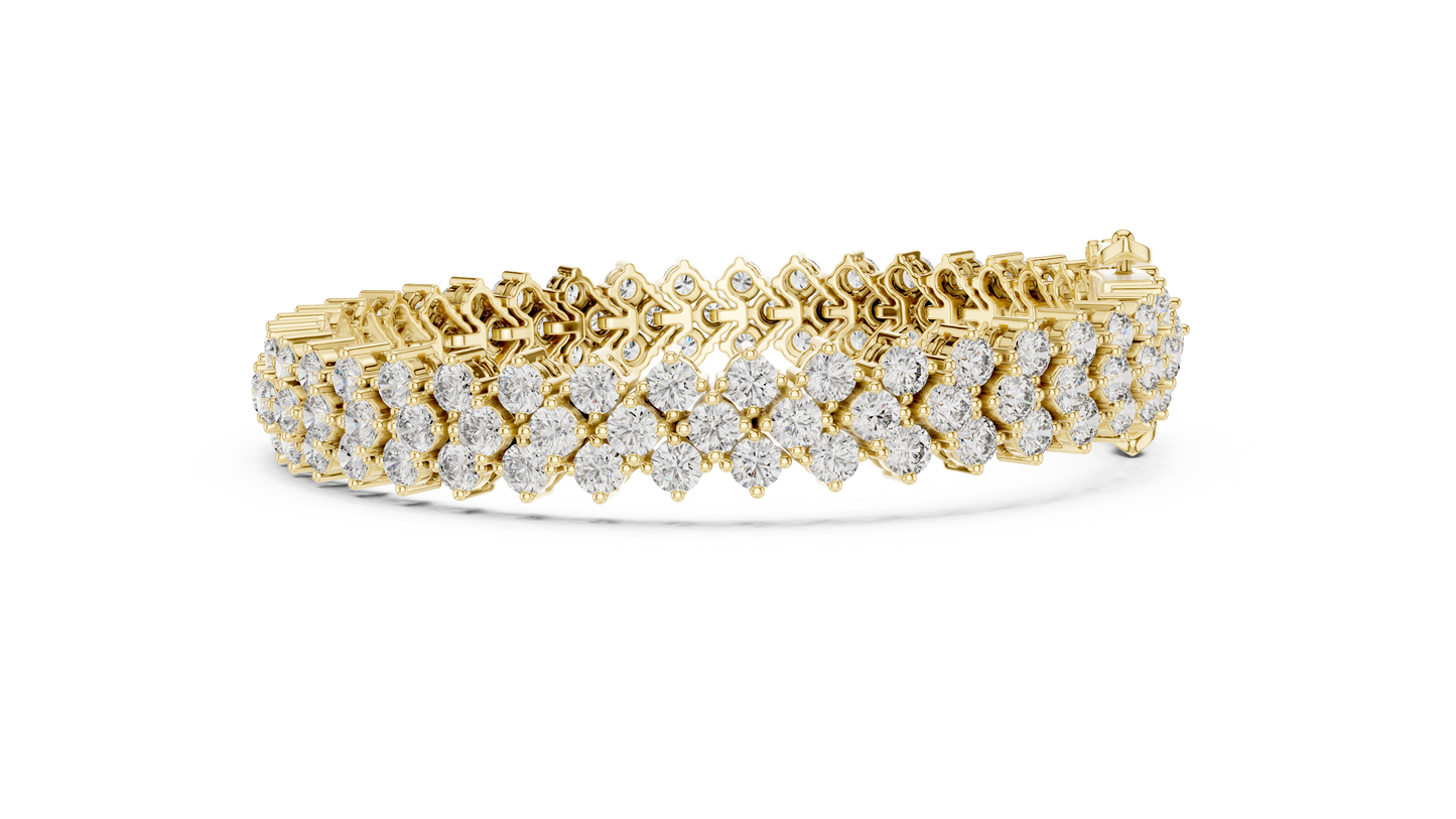 Gold bracelet with diamond accents on a white background