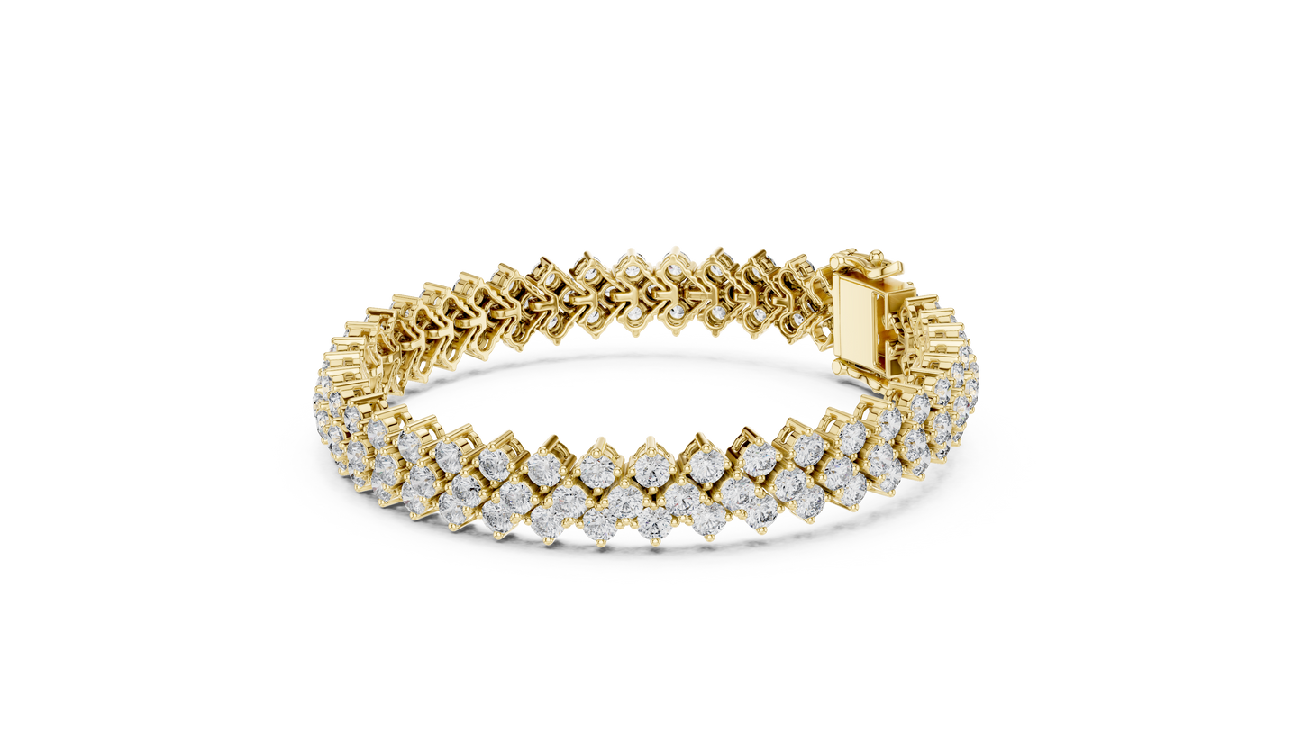 Gold bracelet with diamond accents on a white background