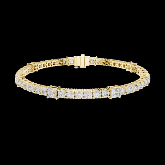 Gold bracelet with diamonds on a white background