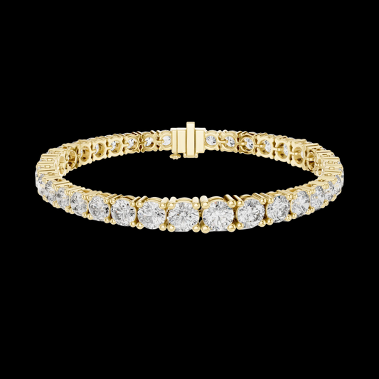 Gold bracelet with diamonds on a white background