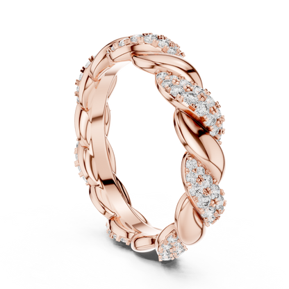 Rose gold ring with diamond accents on a white background