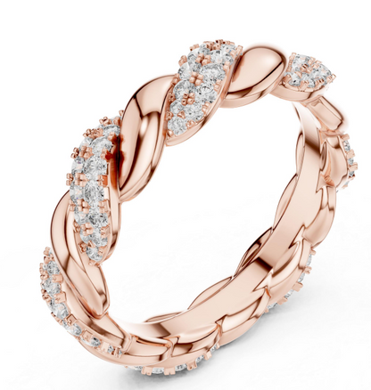 Rose gold ring with diamond accents on a white background