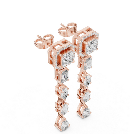 Rose gold earrings with diamond accents on a white background