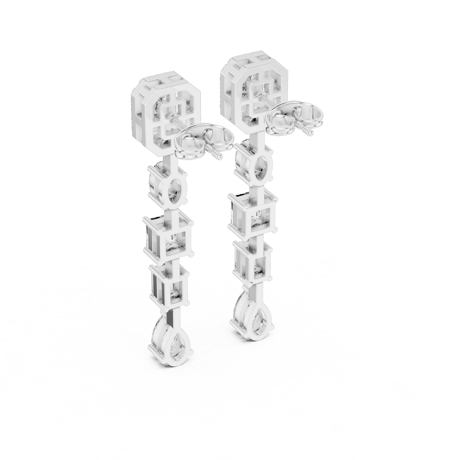 Pair of silver earrings with geometric design on a white background