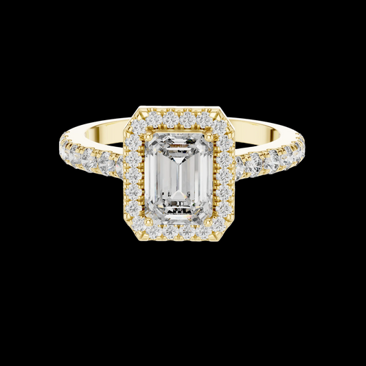 Gold ring with emerald-cut diamond and smaller diamonds on a Black background