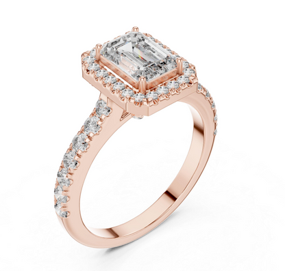 Rose gold ring with a large diamond and smaller diamonds on a white background