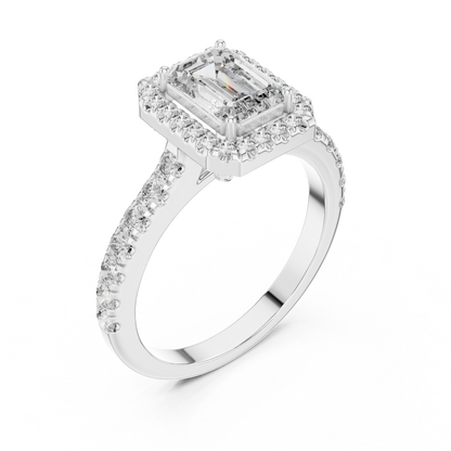 Diamond ring with a rectangular center stone on a white background